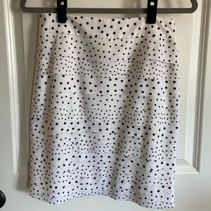 White House Black Market white polka dotted tiered pencil skirt